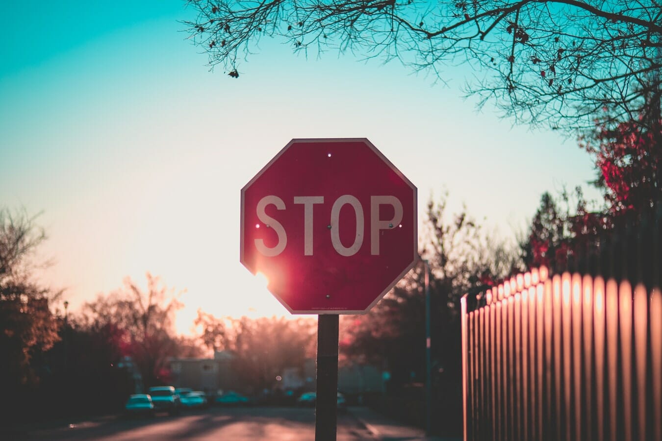 A stop sign in the middle of a street.