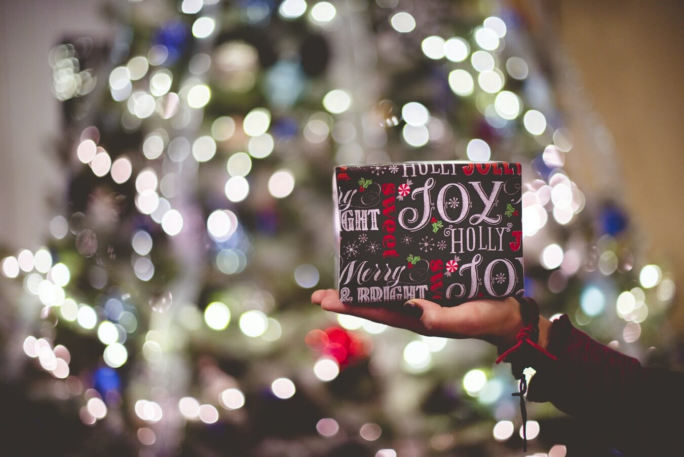 A person holding a present.