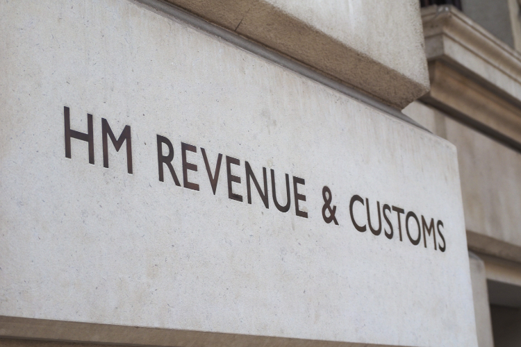 Hm revenue & customs sign on a building.