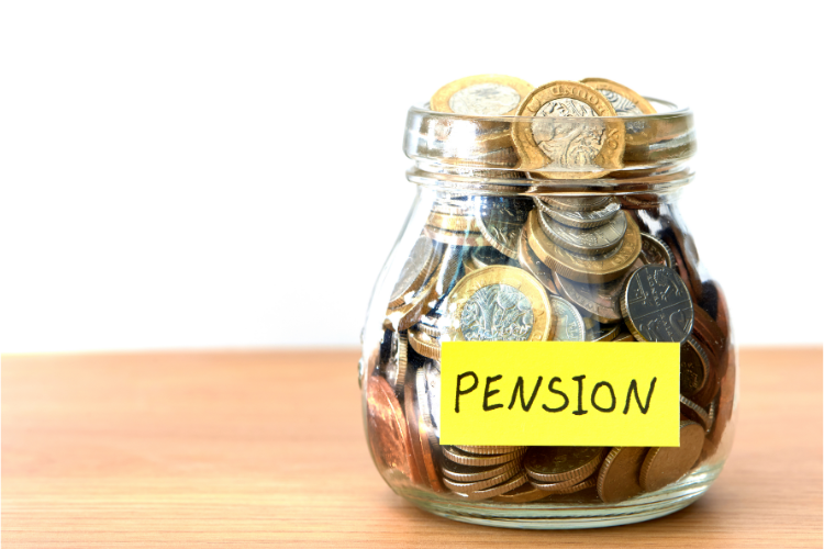 A jar full of coins with the word pension written on it.